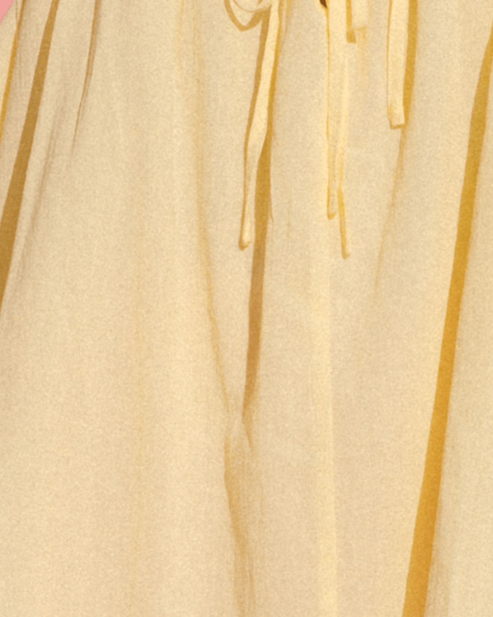 Close-up of bright yellow fabric.