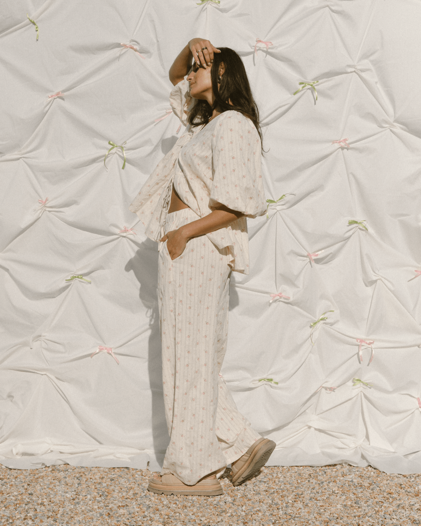 Woman wearing trending floral oversized outfit. 